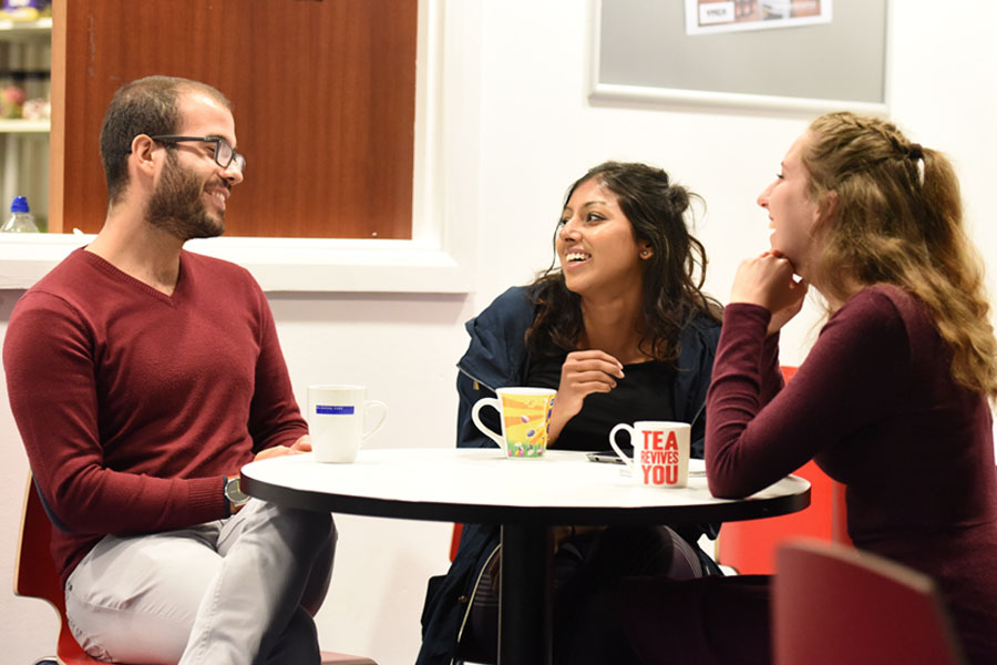 Volunteers chatting around table